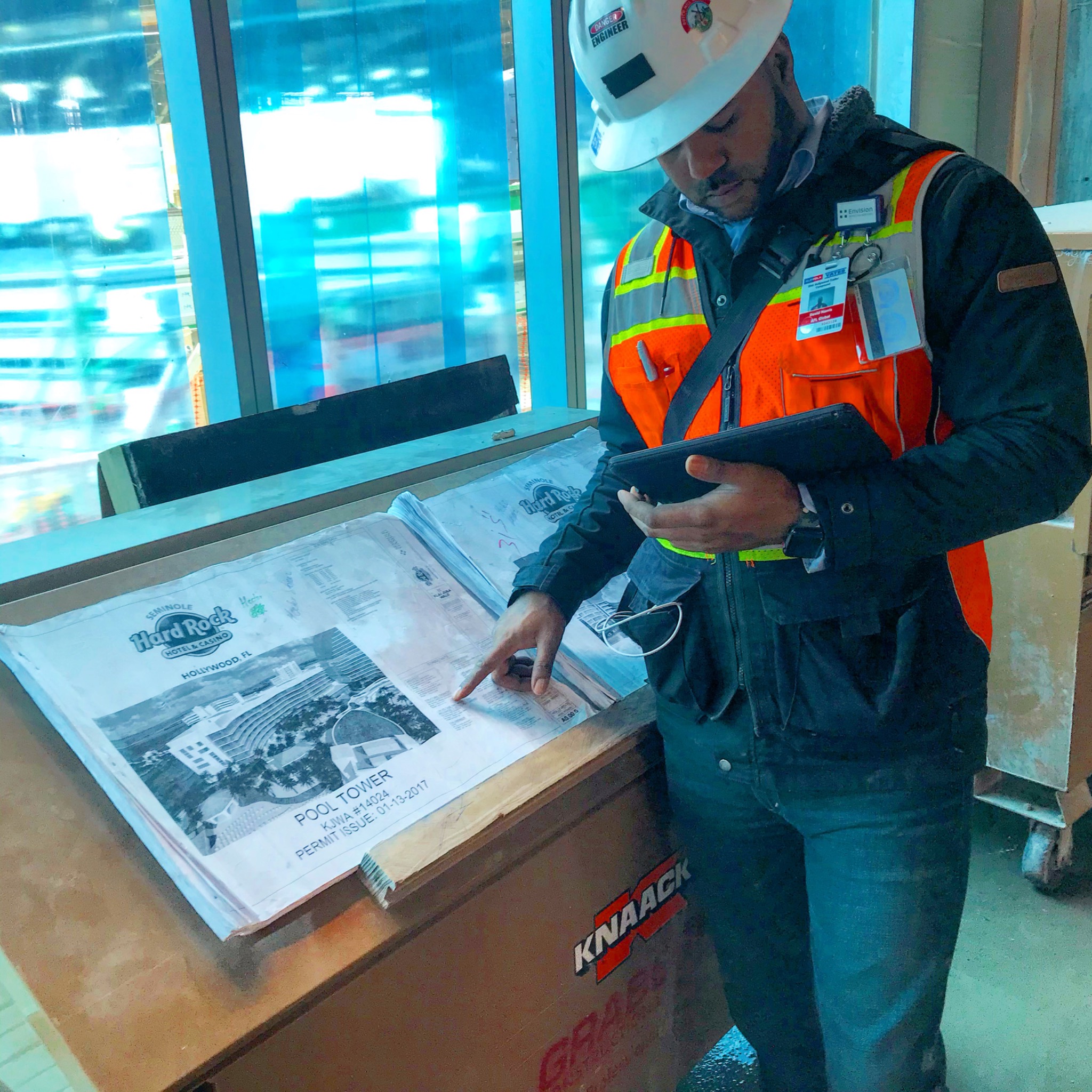 David Norris reviewing project drawings